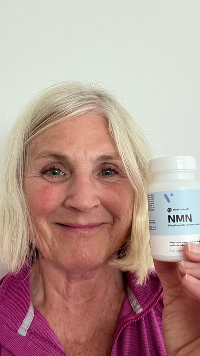 Vivanmn customer with NMN bottle