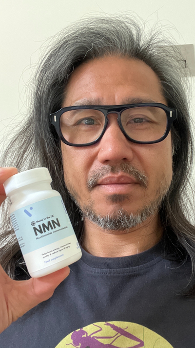 Vivanmn customer with NMN bottle
