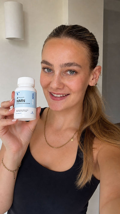 Vivanmn customer with NMN bottle